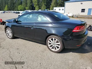 2012 Volkswagen Eos Komfort with VIN WVWBW7AH0CV001922, listed as a Copart auction lot 54378035 with 95,960 mi miles and Salvage Title. Bid and sale history available at DreamBid. Image 2.