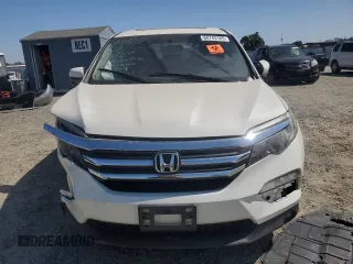2018 Honda Pilot EX-L with VIN 5FNYF6H54JB013986, listed as a Copart auction lot 60743165 with 124,373 mi miles and Salvage title. Bid and sale history available at DreamBid. Image 5.