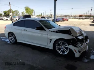 2014 BMW 4 Series 428i with VIN WBA3N3C57EF711803, listed as a Copart auction lot 57856695 with 68,905 mi miles and Salvage title. Bid and sale history available at DreamBid. Image 4.