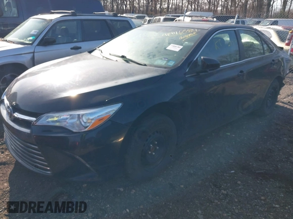 2016 Toyota Camry XLE with VIN 4T4BF1FKXGR549361, listed as a IAAI auction lot 41946584 with 221,775 mi miles and . Bid and sale history available at DreamBid. Image 17.
