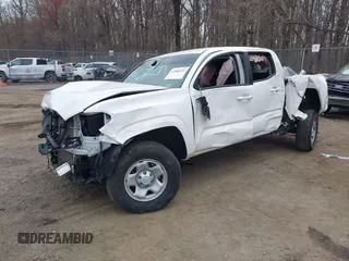 2022 Toyota Tacoma SR with VIN 3TYAX5GN3NT062077, listed as a IAAI auction lot 41886531 with 58,687 mi miles and . Bid and sale history available at DreamBid. Image 17.