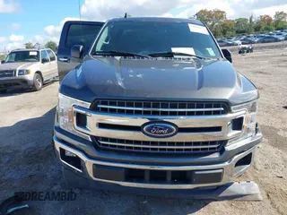 2020 Ford F-150 XL z VIN 1FTEW1CP7LKE32919, wystawiony jako IAAI lot #41082048 z przebiegiem 61 278 mil mil oraz . Historia ofert i sprzedaży dostępna na DreamBid. Obrazek 13.