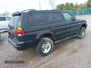 2000 Mitsubishi Montero Sport LS with VIN JA4LS31H0YP809623, listed as a IAAI auction lot 41821577 with 84,850 mi miles. Bid and sale history available at carsss.com. Image 4.