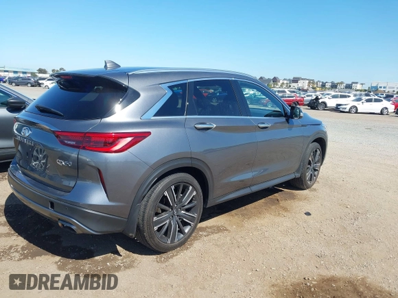 2021 Infiniti QX50 Luxe z VIN 3PCAJ5BA2MF111323, wystawiony jako IAAI lot #42218711 z przebiegiem 27 864 mil mil oraz . Historia ofert i sprzedaży dostępna na DreamBid. Obrazek 4.