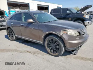 2008 Infiniti FX z VIN JNRAS08W38X203278, wystawiony jako Copart lot #57710405 z przebiegiem 168 007 mil mil oraz Szkoda całkowita • Salvage title. Historia ofert i sprzedaży dostępna na DreamBid. Obrazek 4.