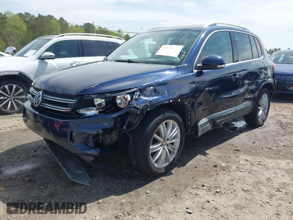 2012 Volkswagen Tiguan S with VIN WVGBV7AX3CW571039, listed as a IAAI auction lot 41928361 with 165,938 mi miles and . Bid and sale history available at DreamBid. Image 18.