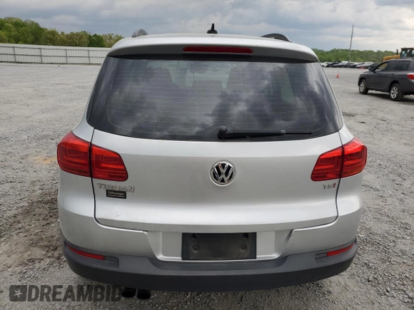 2017 Volkswagen Tiguan S with VIN WVGAV7AX9HK002092, listed as a Copart auction lot 52210695 with 113,791 mi miles and Salvage Title. Bid and sale history available at DreamBid. Image 6.