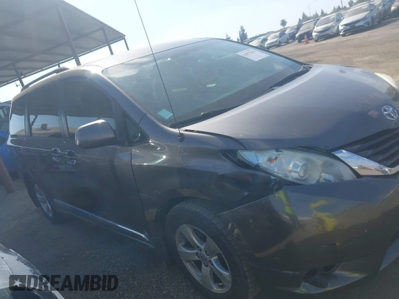 2014 Toyota Sienna LE AAS with VIN 5TDKK3DC0ES498732, listed as a IAAI auction lot 42077044 with 189,745 mi miles and . Bid and sale history available at carsss.com. Image 14.