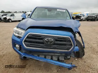 2018 Toyota Tacoma SR5 z VIN 3TMAZ5CN6JM075279, wystawiony jako Copart lot #55894855 z przebiegiem 134 746 mil mil oraz Szkoda całkowita • Salvage title. Historia ofert i sprzedaży dostępna na DreamBid. Obrazek 5.