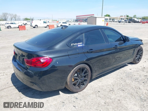 2019 BMW 4 Series 430i with VIN WBA4J1C59KBM17309, listed as a IAAI auction lot 42011443 with 87,189 mi miles. Bid and sale history available at carsss.com. Image 4.