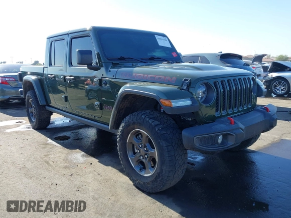 2022 Jeep Gladiator Rubicon z VIN 1C6JJTBG1NL163699, wystawiony jako IAAI lot #41014300 z przebiegiem Nie podano mil oraz . Historia ofert i sprzedaży dostępna na DreamBid. Obrazek 1.