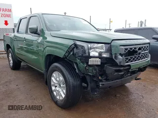 2022 Nissan Frontier Pro-4X z VIN 1N6ED1EK7NN663549, wystawiony jako IAAI lot #42116722 z przebiegiem 49 125 mil mil oraz . Historia ofert i sprzedaży dostępna na DreamBid. Obrazek 1.