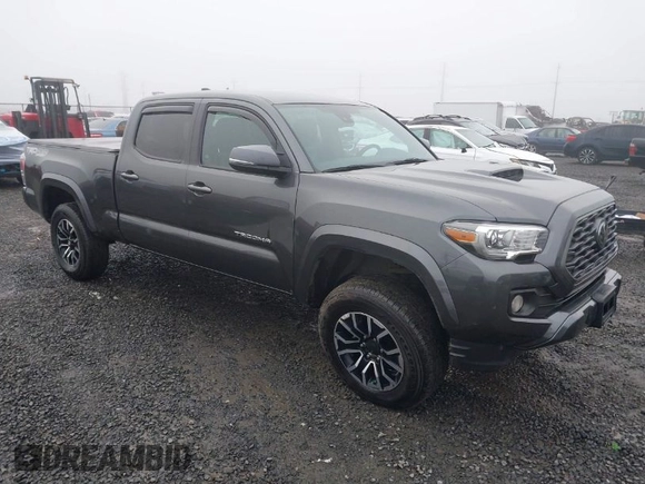 2021 Toyota Tacoma 4WD SR5 with VIN 3TMDZ5BN4MM099423, listed as a IAAI auction lot 41208397 with 62,935 mi miles. Bid and sale history available at carsss.com. Image 1.
