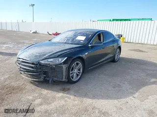 2013 Tesla Model S with VIN 5YJSA1CN9DFP26188, listed as a IAAI auction lot 41629934 with 1 mi miles. Bid and sale history available at carsss.com. Image 20.