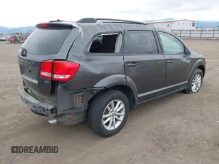 2017 Dodge Journey SXT z VIN 3C4PDDBG2HT578538, wystawiony jako IAAI lot #41765388 z przebiegiem 87 471 mil mil oraz . Historia ofert i sprzedaży dostępna na DreamBid. Obrazek 4.