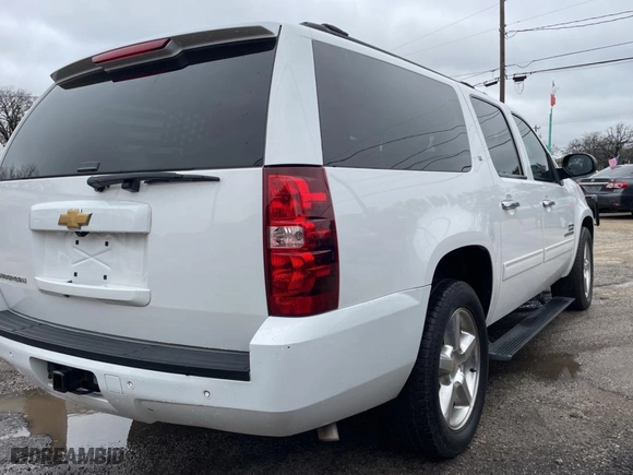2013 Chevrolet Suburban LT with VIN 1GNSCJE0XDR295860, listed as a Copart auction lot 45344455 with 216,572 mi miles and Clean Title. Bid and sale history available at carsss.com. Image 4.