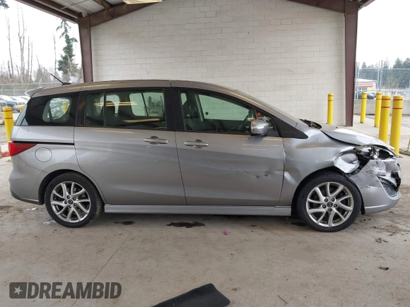 2014 Mazda 5 Touring with VIN JM1CW2CL6E0164146, listed as a IAAI auction lot 41458945 with 157,345 mi miles. Bid and sale history available at carsss.com. Image 13.