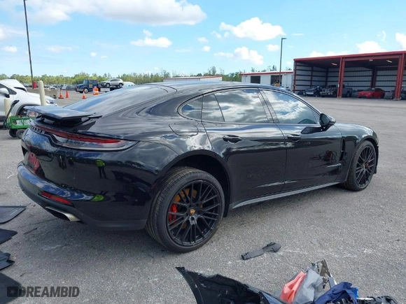 2021 Porsche Panamera with VIN WP0AJ2A73ML116385, listed as a IAAI auction lot 41549006 with 50,292 mi miles. Bid and sale history available at carsss.com. Image 4.