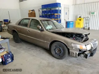 2003 Mercury Grand Marquis GS Convenience with VIN 2MEFM74W43X706057, listed as a Copart auction lot 65842884 with 215,829 mi miles and Salvage Title. Bid and sale history available at carsss.com. Image 4.