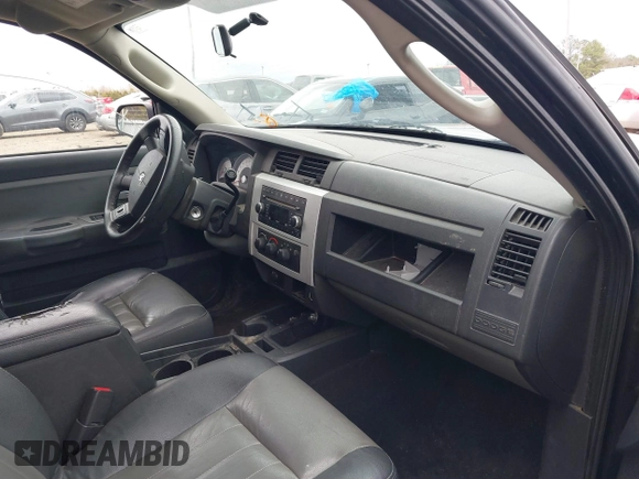 2008 Dodge Dakota Laramie with VIN 1D7HW58NX8S602604, listed as a IAAI auction lot 41717006 with 167,023 mi miles. Bid and sale history available at carsss.com. Image 5.