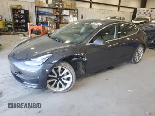 2018 Tesla Model 3 Long Range Battery with VIN 5YJ3E1EA5JF059313, listed as a Copart auction lot 51039105 with 73,706 mi miles and Salvage Title. Bid and sale history available at carsss.com. Image 1.