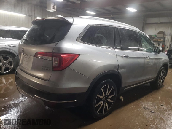 2021 Honda Pilot Elite with VIN 5FNYF6H04MB053008, listed as a Copart auction lot 87802955 with 70,737 mi miles and Salvage Title. Bid and sale history available at carsss.com. Image 3.