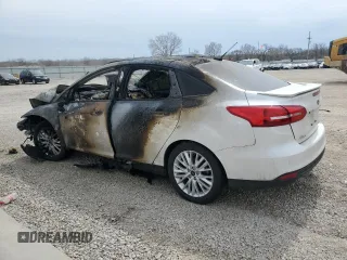 2017 Ford Focus Titanium с VIN 1FADP3J29HL245054, выставлен на аукционе Copart как лот 50784925 с пробегом Не указан миль и На запчасти • Non repairable. История ставок и продаж доступна на DreamBid. Изображение 2.