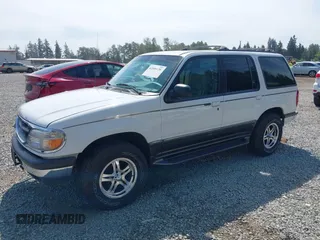 1998 Ford Explorer XL z VIN 1FMZU34E3WZA90831, wystawiony jako IAAI lot #42500120 z przebiegiem 97 799 mil mil oraz . Historia ofert i sprzedaży dostępna na DreamBid. Obrazek 16.