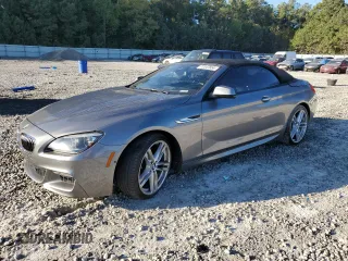2014 BMW 6 Series 640i with VIN WBALW7C55EDX58778, listed as a Copart auction lot 77047654 with 62,383 mi miles and Salvage Title. Bid and sale history available at carsss.com. Image 1.