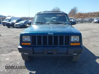 1998 Jeep Cherokee Sport z VIN 1J4FJ68S2WL136129, wystawiony jako IAAI lot #41810918 z przebiegiem 269 989 mil mil oraz . Historia ofert i sprzedaży dostępna na DreamBid. Obrazek 6.