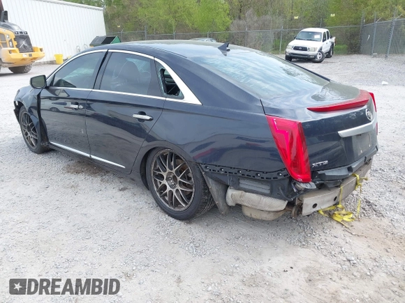 2013 Cadillac XTS Premium with VIN 2G61S5S31D9196354, listed as a IAAI auction lot 41905983 with 197,605 mi miles. Bid and sale history available at carsss.com. Image 3.