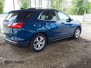 2021 Chevrolet Equinox LT z VIN 3GNAXKEVXML350994, wystawiony jako IAAI lot #42201733 z przebiegiem 31 429 mil mil oraz . Historia ofert i sprzedaży dostępna na DreamBid. Obrazek 4.