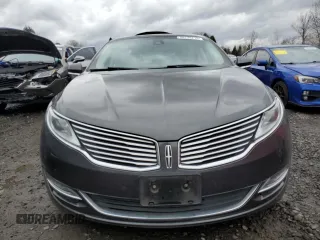 2015 Lincoln MKZ with VIN 3LN6L2GK4FR621797, listed as a Copart auction lot 48238215 with 100,738 mi miles and Salvage Title. Bid and sale history available at DreamBid. Image 5.