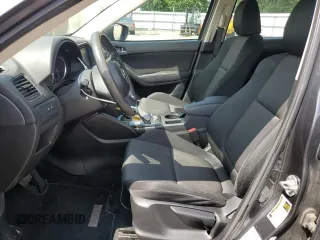 2016 Mazda CX-5 Sport z VIN JM3KE2BY4G0632946, wystawiony jako Copart lot #61447435 z przebiegiem 178 492 mil mil oraz Szkoda całkowita • Salvage title. Historia ofert i sprzedaży dostępna na DreamBid. Obrazek 7.