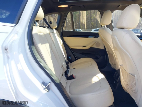 2017 BMW X1 xDrive28i with VIN WBXHT3C37H5F69725, listed as a IAAI auction lot 41588095 with 109,704 mi miles. Bid and sale history available at carsss.com. Image 8.