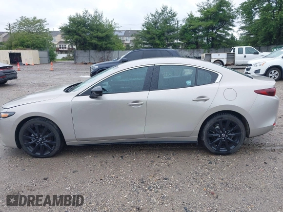 2024 Mazda 3 S Select Sport with VIN 3MZBPABM0RM403431, listed as a IAAI auction lot 42366921 with Not provided miles and . Bid and sale history available at DreamBid. Image 14.