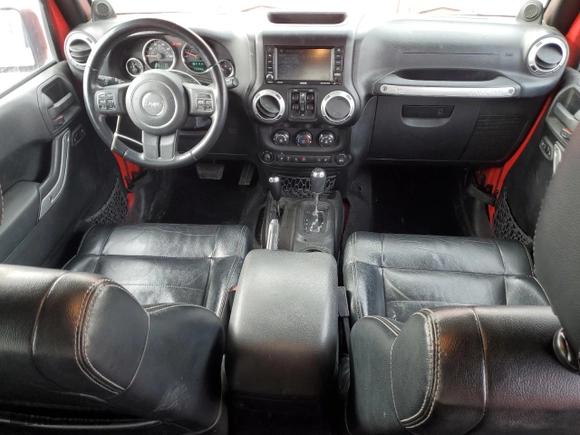 2012 Jeep Wrangler Unlimited Sahara with VIN 1C4BJWEGXCL223261, listed as a Copart auction lot 49350525 with 153,256 mi miles and Salvage Title. Bid and sale history available at carsss.com. Image 8.
