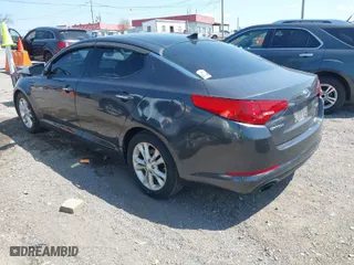 2011 Kia Optima EX with VIN KNAGN4A70B5191862, listed as a IAAI auction lot 41971997 with 146,392 mi miles. Bid and sale history available at carsss.com. Image 3.