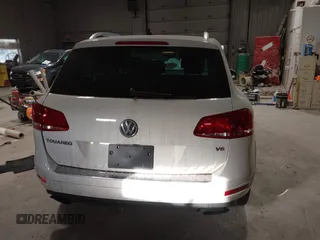 2011 Volkswagen Touareg Sport with VIN WVGFF9BP8BD004747, listed as a IAAI auction lot 41780515 with 159,228 mi miles and . Bid and sale history available at DreamBid. Image 16.