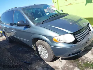 2007 Chrysler Town & Country LWB LX with VIN 2A4GP44R97R351932, listed as a IAAI auction lot 41693734 with 244,286 mi miles. Bid and sale history available at carsss.com. Image 1.