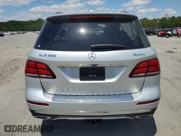 2018 Mercedes-Benz GLE 350 с VIN 4JGDA5HB6JB004072, выставлен на аукционе Copart как лот 55156535 с пробегом 98 193 миль миль и Списание • Salvage title. История ставок и продаж доступна на DreamBid. Изображение 6.