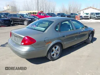 2002 Ford Taurus SES Standard with VIN 1FAFP55UX2G272540, listed as a IAAI auction lot 41874683 with 199,073 mi miles. Bid and sale history available at carsss.com. Image 4.