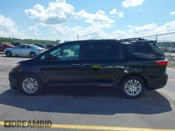 2016 Toyota Sienna XLE with VIN 5TDYK3DC8GS711357, listed as a IAAI auction lot 42525086 with 180,296 mi miles and . Bid and sale history available at DreamBid. Image 14.