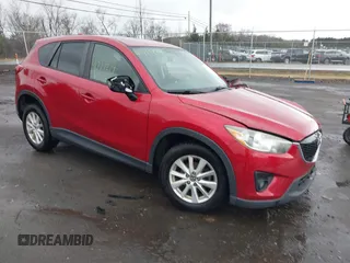 2014 Mazda CX-5 Touring with VIN JM3KE2CY2E0322211, listed as a IAAI auction lot 41721219 with 127,312 mi miles. Bid and sale history available at carsss.com. Image 1.