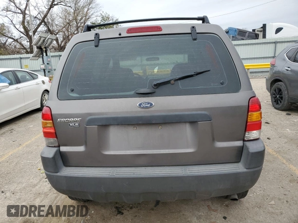 2002 Ford Escape XLS Choice with VIN 1FMYU02102KB67376, listed as a Copart auction lot 79109394 with 234,306 mi miles and Salvage title. Bid and sale history available at DreamBid. Image 6.