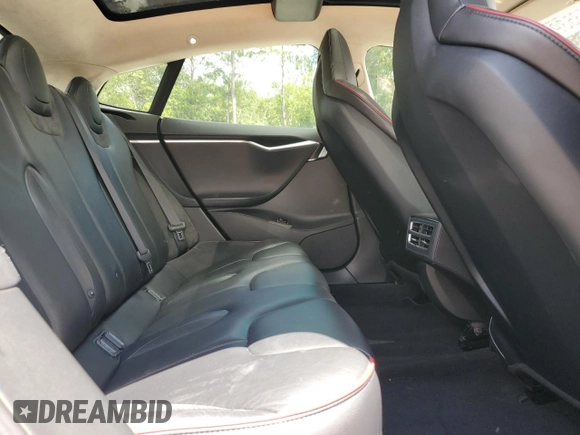 2013 Tesla Model S Performance с VIN 5YJSA1CP8DFP20786, выставлен на аукционе Copart как лот 61035395 с пробегом 140 119 миль миль и Списание • Salvage title. История ставок и продаж доступна на DreamBid. Изображение 10.