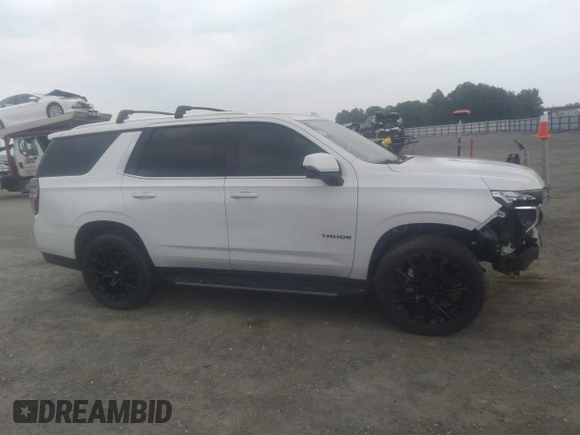 2022 Chevrolet Tahoe LT with VIN 1GNSKNKD5NR143276, listed as a IAAI auction lot 42268541 with 54,463 mi miles and . Bid and sale history available at DreamBid. Image 14.