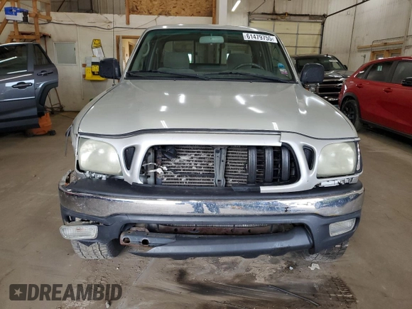 2003 Toyota Tacoma with VIN 5TEWN72N03Z291245, listed as a Copart auction lot 61479755 with 359,047 mi miles and Salvage title. Bid and sale history available at DreamBid. Image 5.