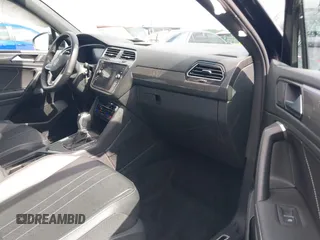 2023 Volkswagen Tiguan SE R-Line Black с VIN 3VVCB7AX3PM131427, выставлен на аукционе IAAI как лот 42314267 с пробегом 19 250 миль миль и . История ставок и продаж доступна на DreamBid. Изображение 5.