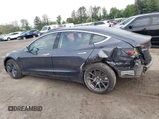2018 Tesla Model 3 Long Range Battery z VIN 5YJ3E1EB3JF086972, wystawiony jako Copart lot #56290245 z przebiegiem 69 766 mil mil oraz Szkody całkowita. Historia ofert i sprzedaży dostępna na DreamBid. Obrazek 2.